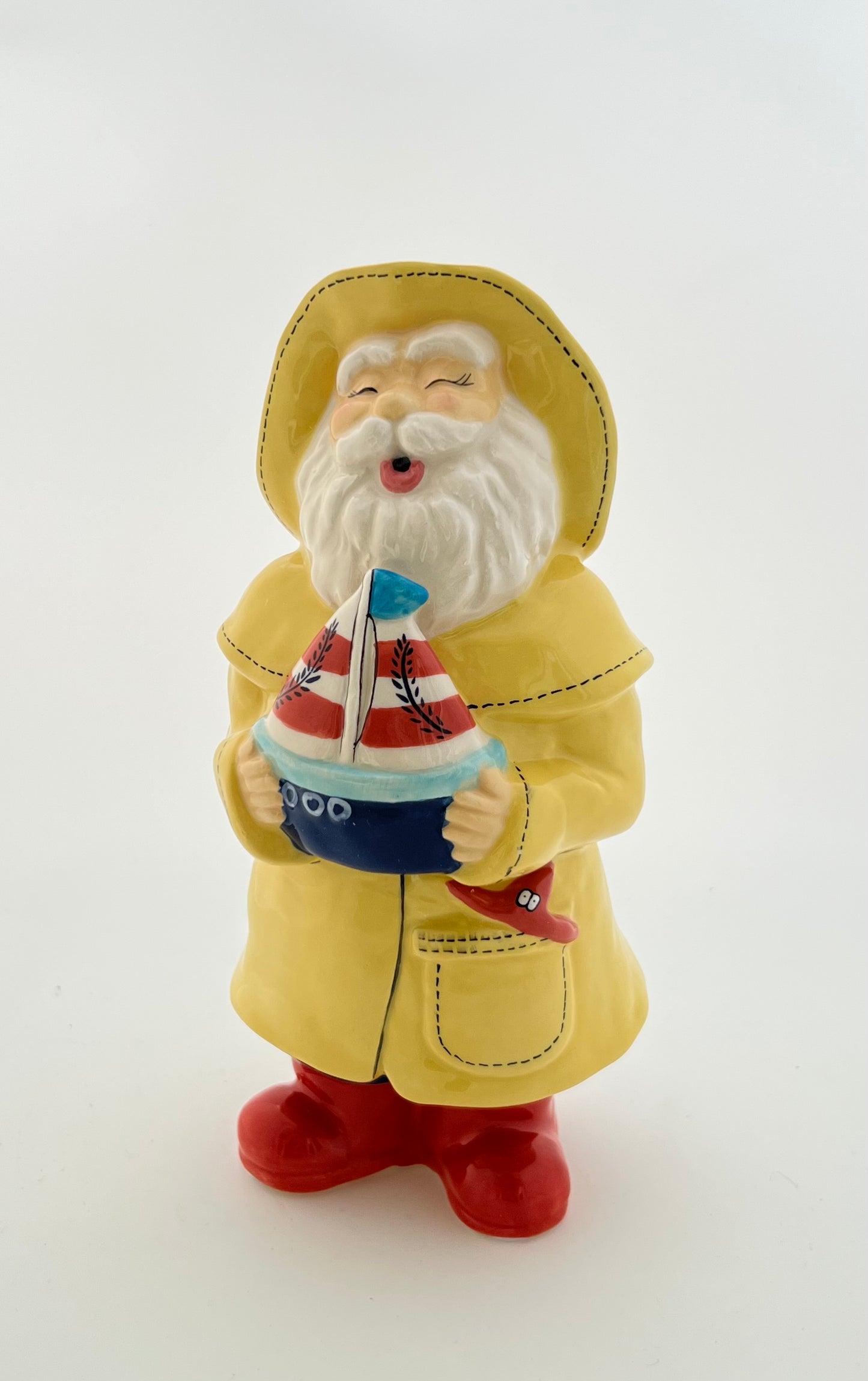 Man Holds the Sailboat
