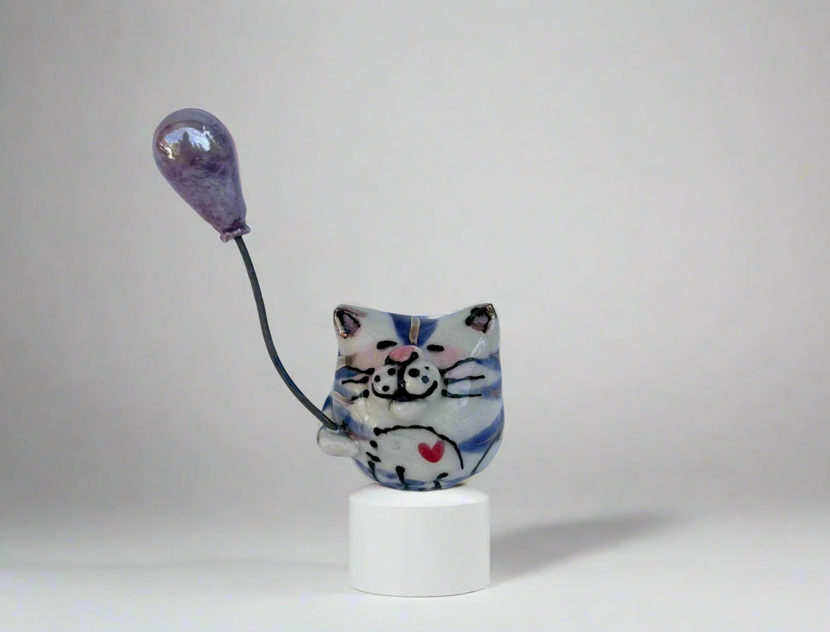 Grey Tiny Cat with Balloon