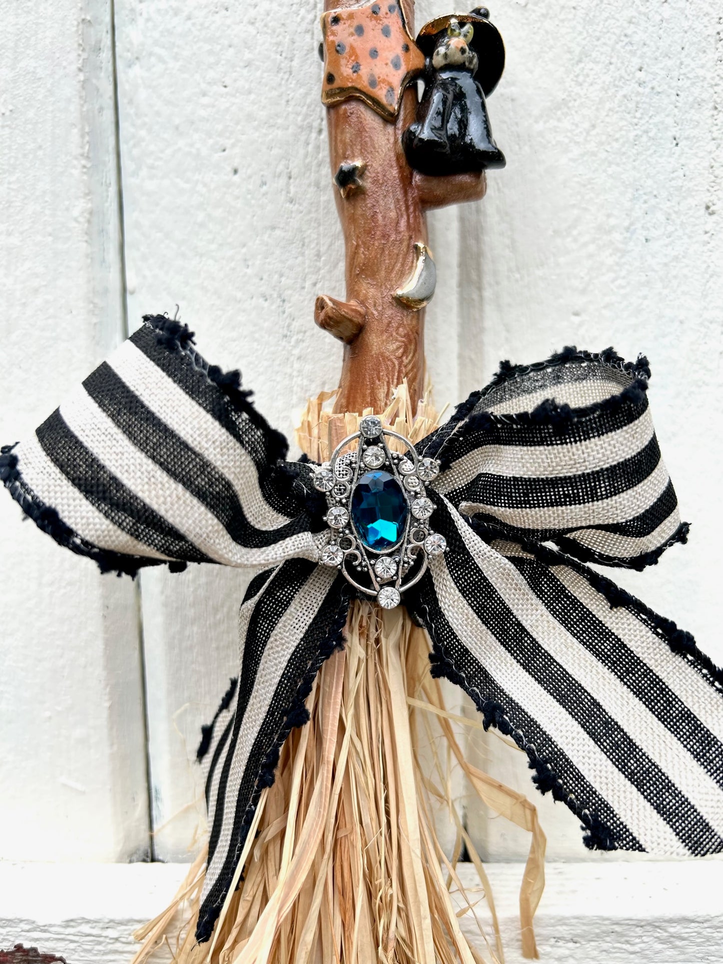 Small Broomstick with Blue Broach