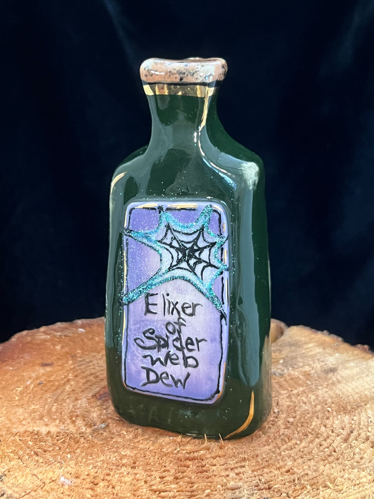 Elixer of Spiderweb Dew Potion Bottle