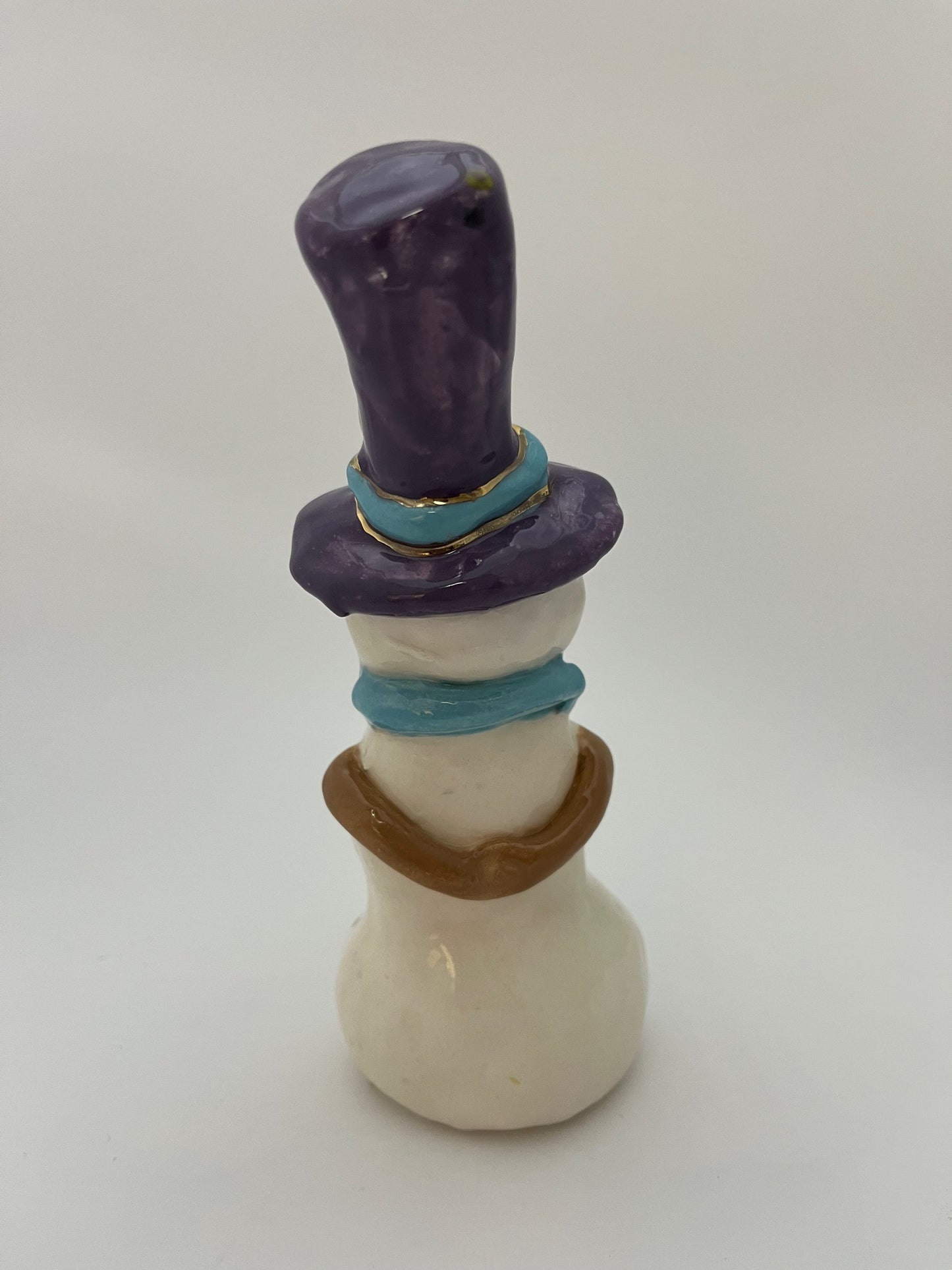Holiday Snowman with Purple Hat and Blue Scarf