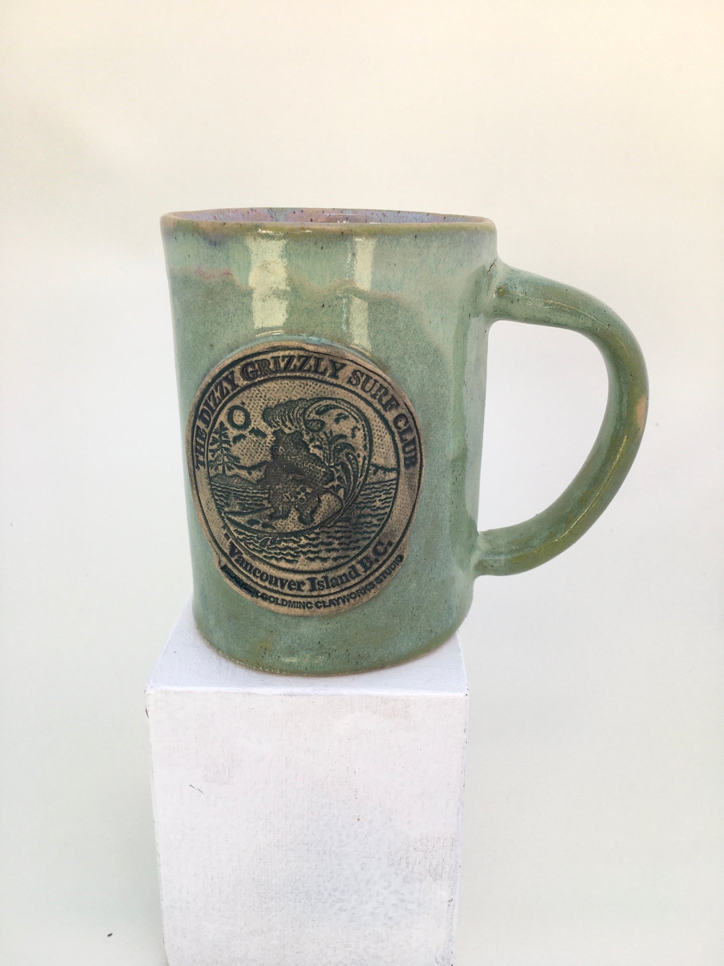 The Dizzy Grizzly Surf Club Mug (tall green)